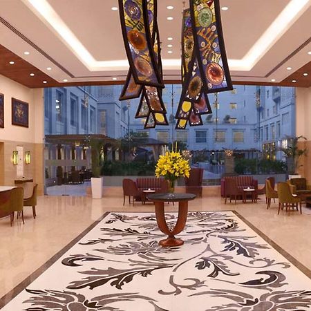 Lemon Tree Premier, Delhi Airport Hotel New Delhi Buitenkant foto The lobby of the Taj Bengal